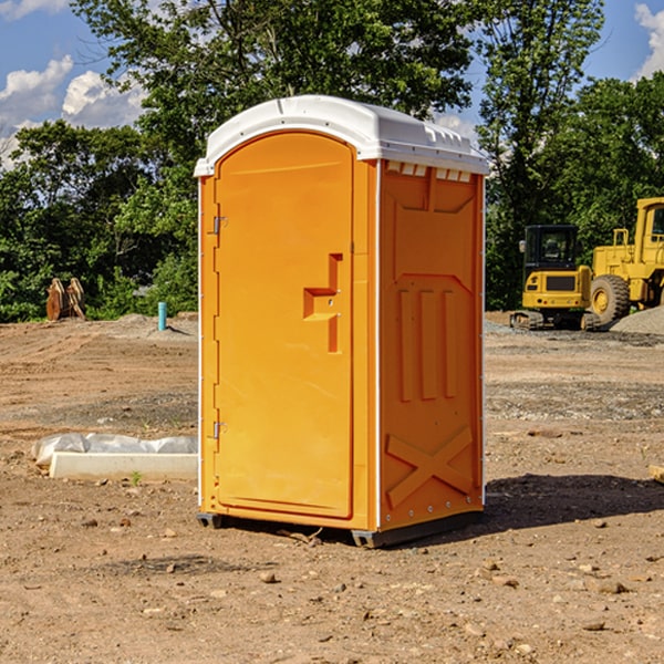 how often are the portable restrooms cleaned and serviced during a rental period in Summitville